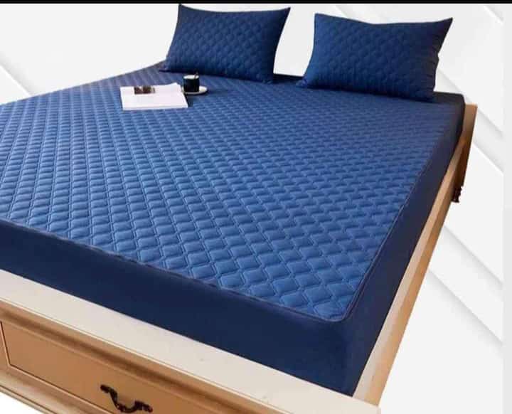 Protector de Colchón Antifluidos Premium + 2 Fundas de Almohada de Regalo.